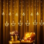 Illuminate your celebrations with Desidiya’s Warm White Diya Light Curtain. Featuring 12 hanging diyas and 8 flashing modes, this energy-efficient LED string light is perfect for Diwali, weddings, and year-round decor.